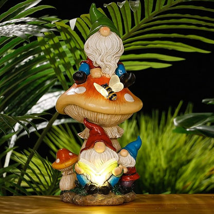 TERESA'S COLLECTIONS Garden Gnomes Statues Decorations for Yard with Solar Lights, Resin Gnome on Mushroom Reading Garden Decor Outdoor for Patio Lawn Ornaments,Ideal Gifts for Dad and Mom, 12.6"