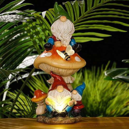TERESA'S COLLECTIONS Garden Gnomes Statues Decorations for Yard with Solar Lights, Resin Gnome on Mushroom Reading Garden Decor Outdoor for Patio Lawn Ornaments,Ideal Gifts for Dad and Mom, 12.6"